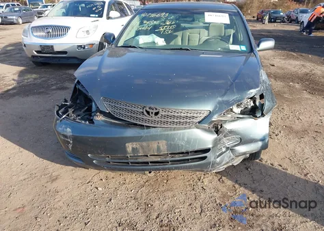 2004 Toyota Camry Le z USA, uszkodzony, nr VIN 4T1BE32K94U282921